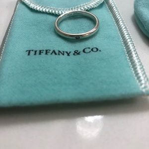 Engraved Silver Tiffany ring with a small diamond